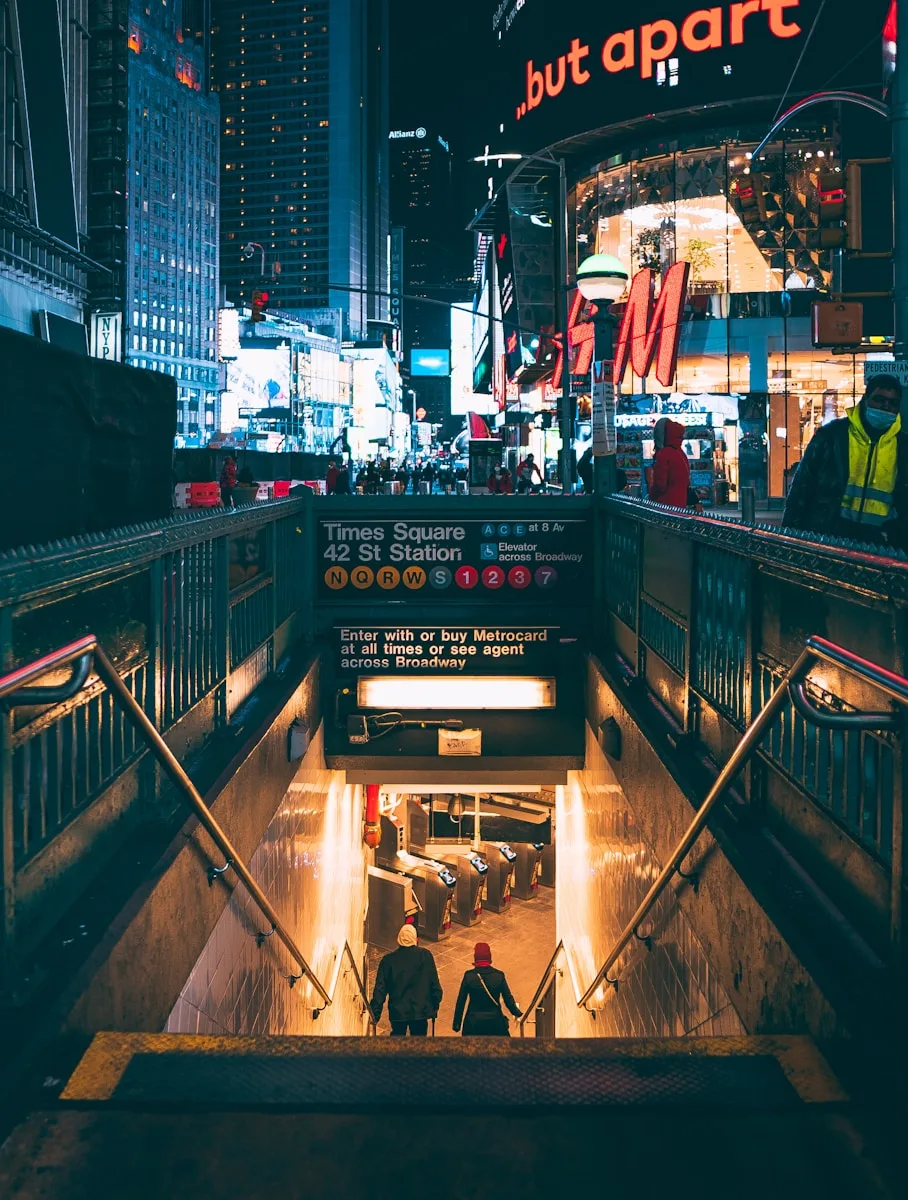 a couple of people that are walking down some stairs