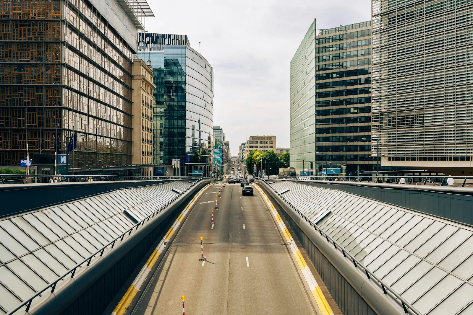 A view of a city street from a moving vehicle