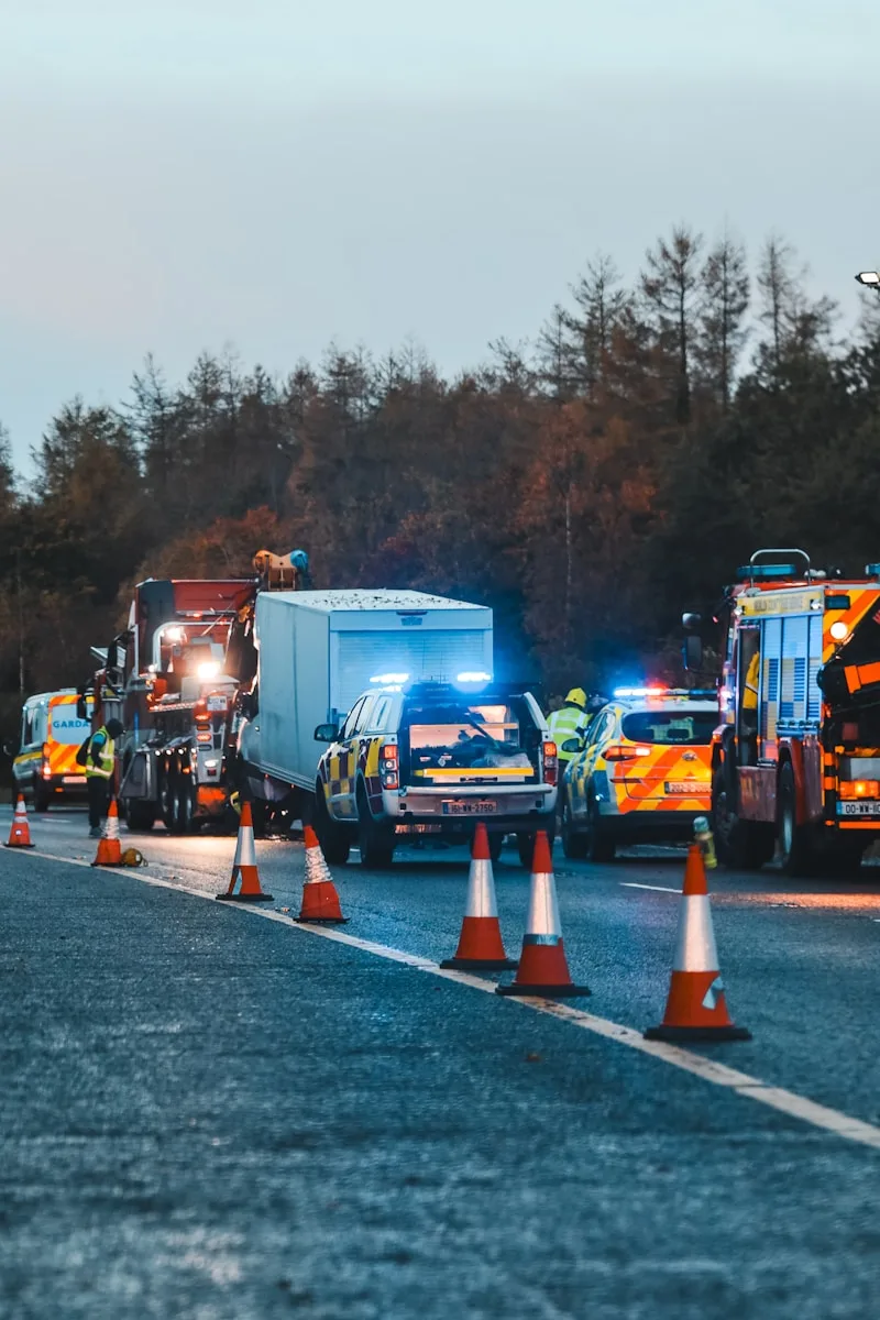 a couple of trucks that are sitting in the street