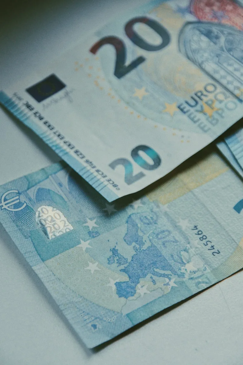 20 euro bill on white paper