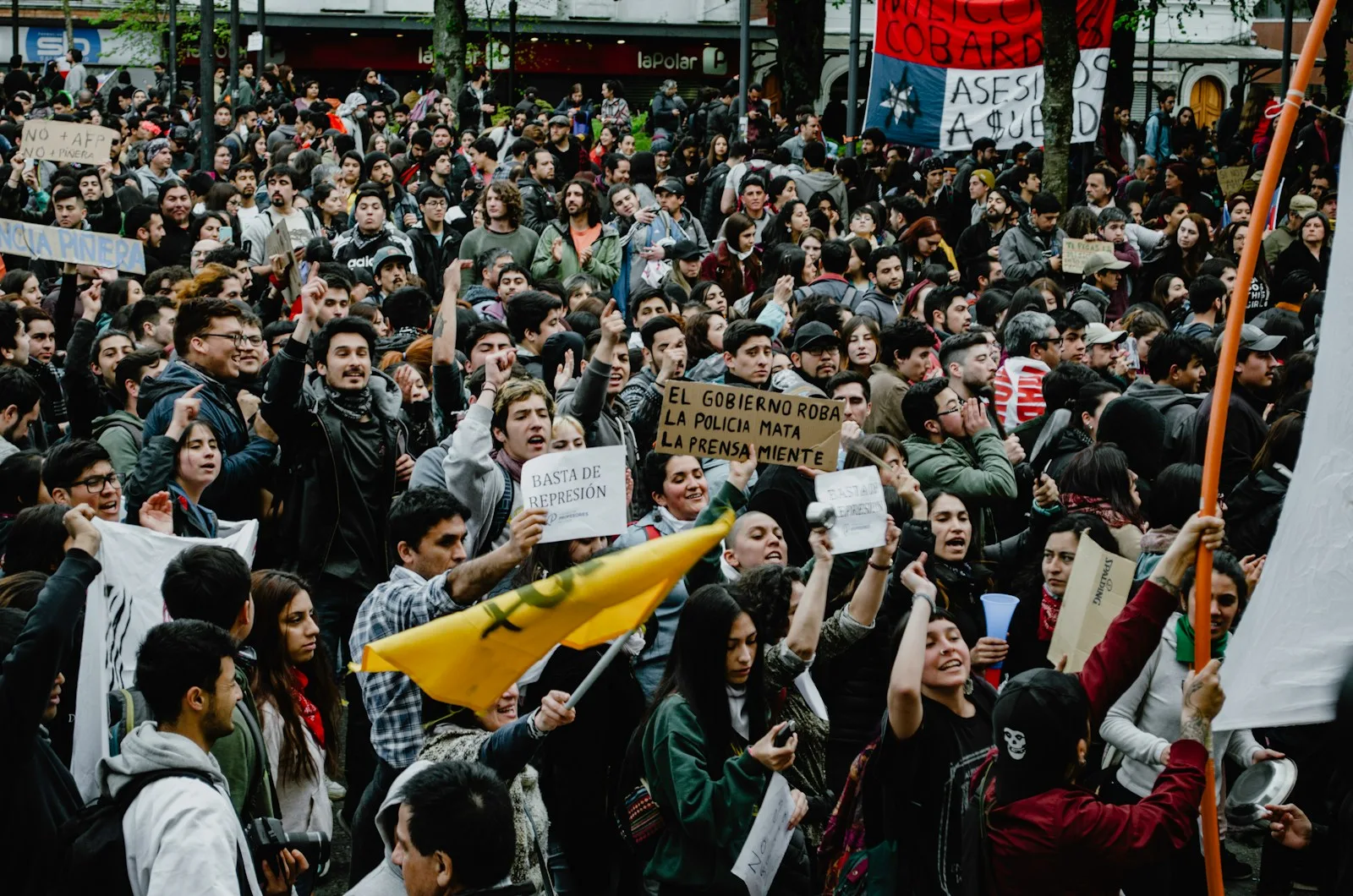 group of people protesting outdoors