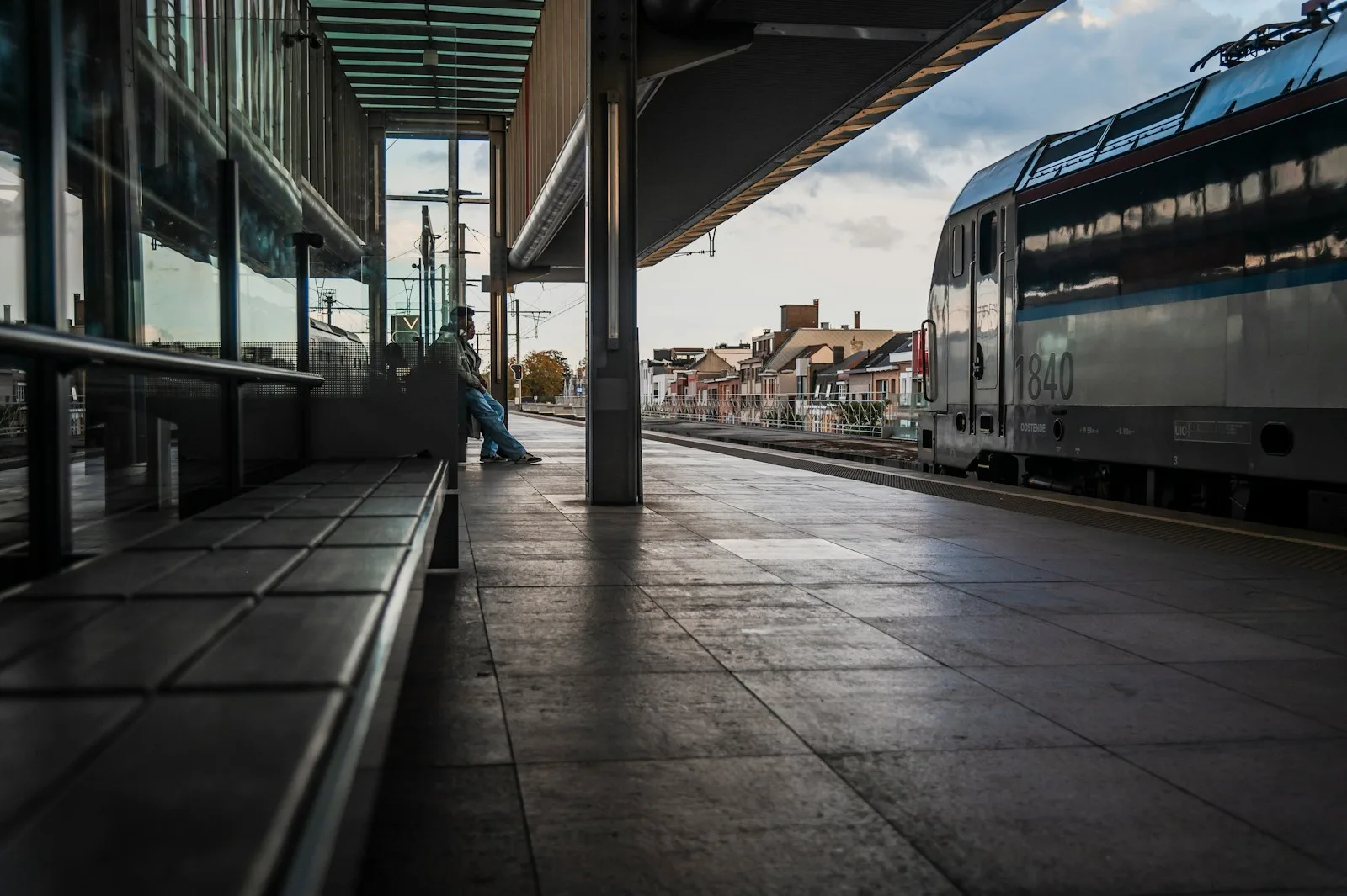 A train is parked at a train station