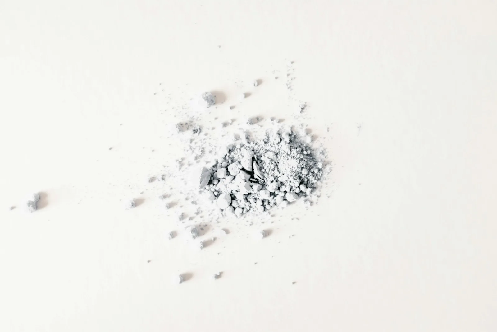 a pile of white powder sitting on top of a white table