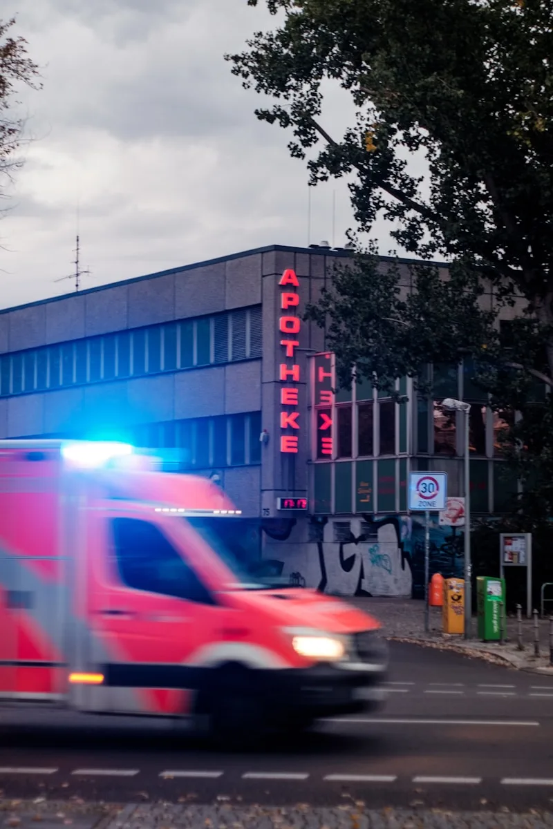 red car near building