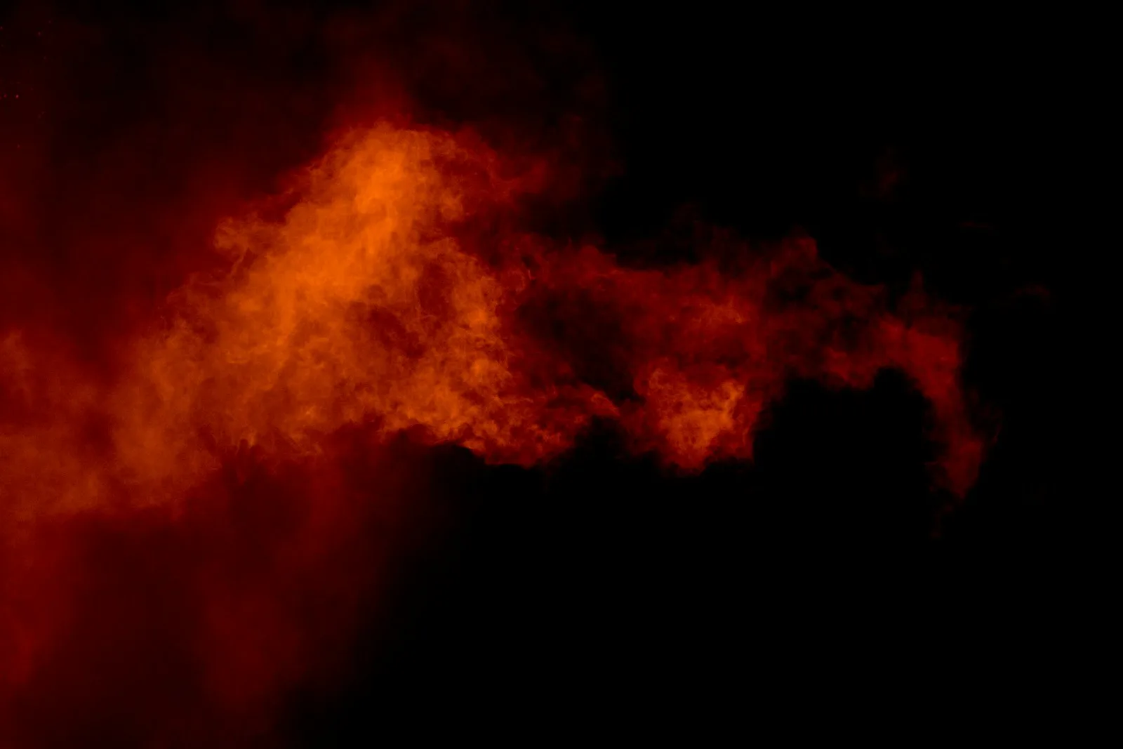 brown smoke on black background