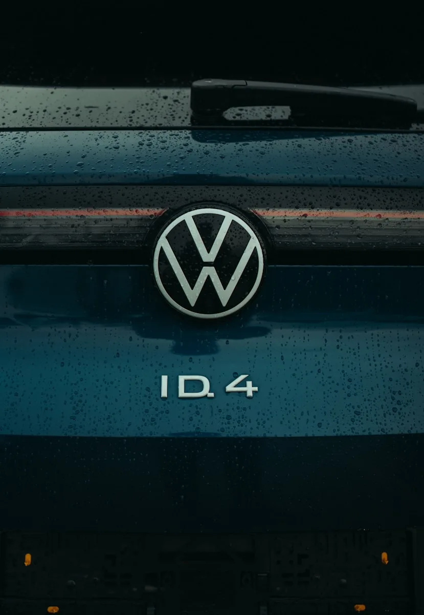 A close up of a volkswagen logo on a car