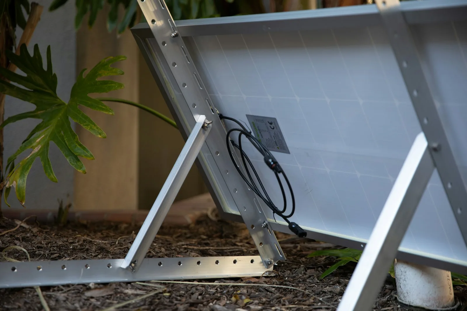 a metal frame with a power cord attached to it