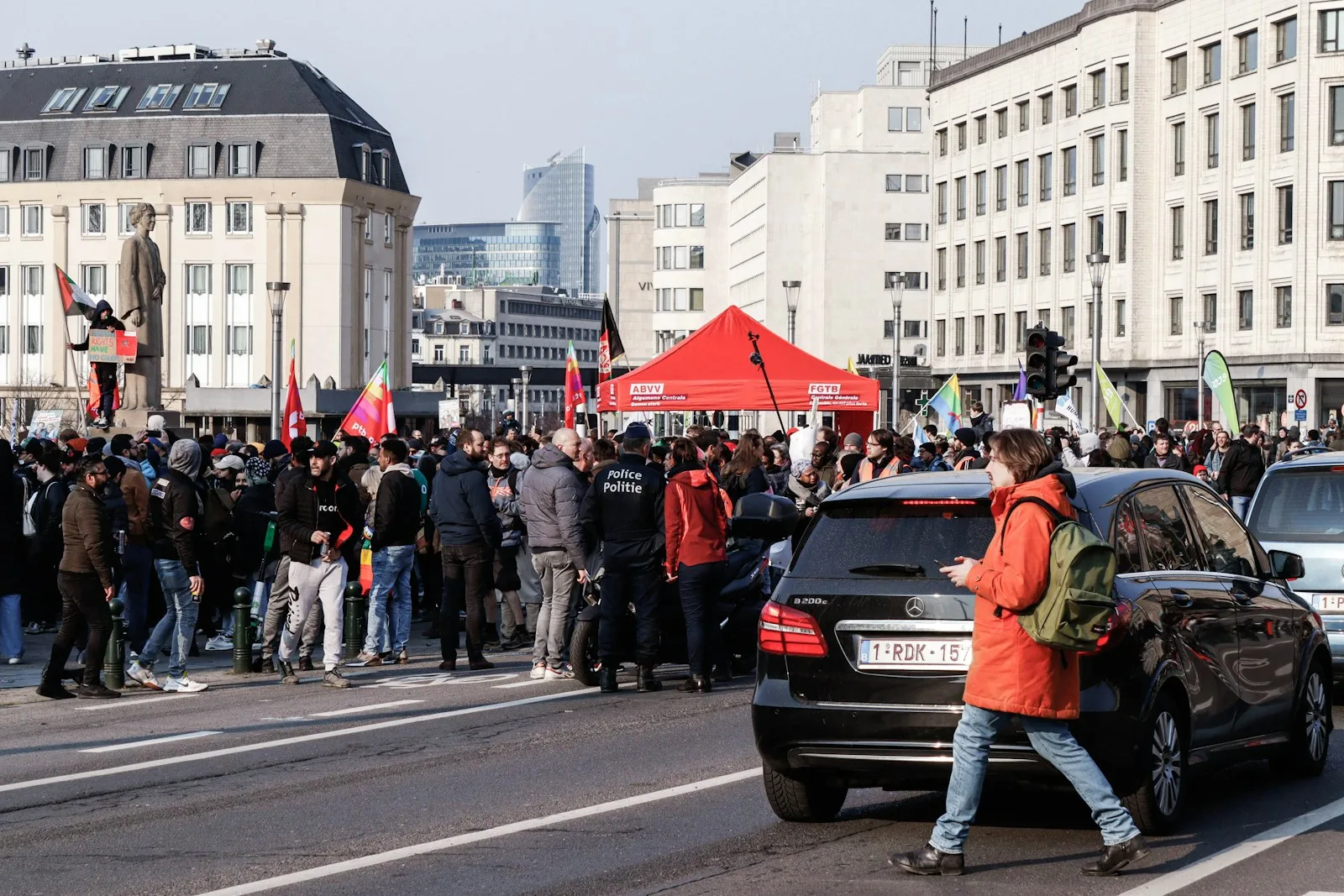 a large group of people gathered in a street