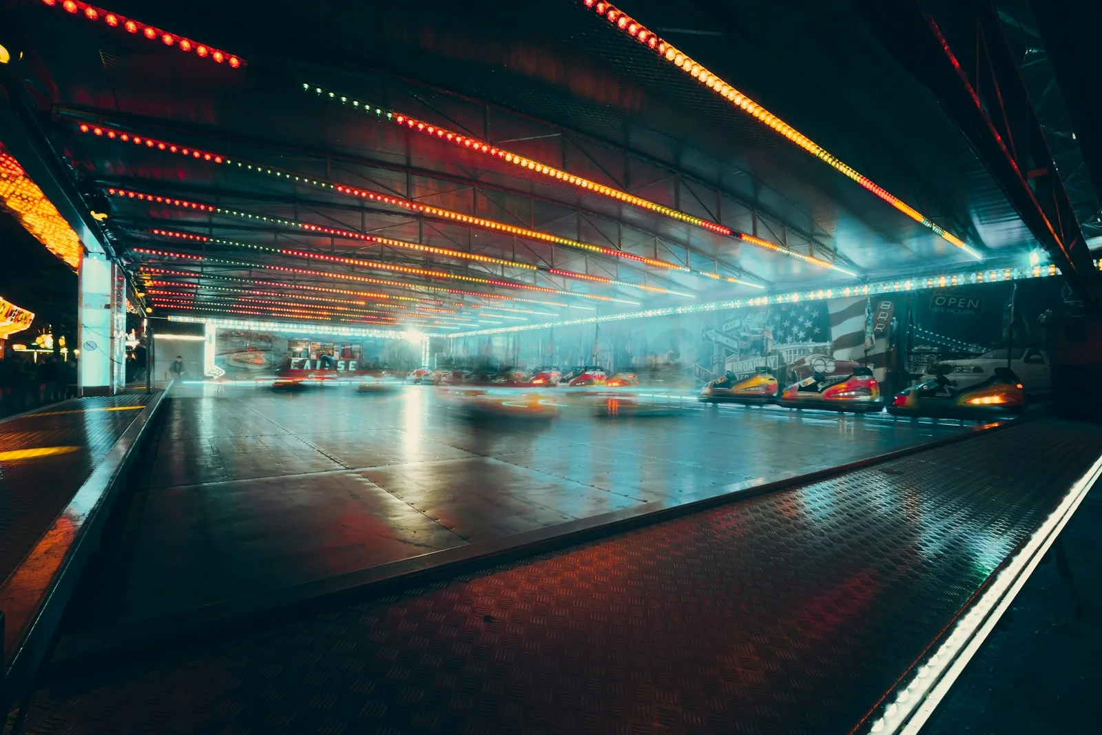 lighted parking lot with cars