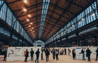 a group of people standing inside of a building