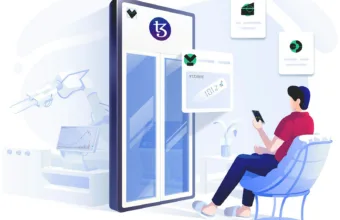 a man sitting in a chair looking at his cell phone